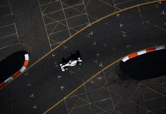 MELBOURNE, AUSTRALIA - MARCH 28:  Jenson Button of Great Britain and Brawn GP drives on his way to taking pole position during qualifying for the Australian Formula One Grand Prix at the Albert Park Circuit on March 28, 2009 in Melbourne, Australia.  (Photo by Clive Mason/Getty Images)