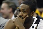 CLEVELAND - APRIL 21:  Gilbert Arenas #0 of the Washington Wizards looks on from the bench late in the game while playing the Cleveland Cavaliers in Game Two of the Eastern Conference Quarterfinals during the 2008 NBA Playoffs at Quicken Loans Arena April 21, 2008 in Cleveland, Ohio. Cleveland won the game 116-86. NOTE TO USER: User expressly acknowledges and agrees that, by downloading and or using this photograph, User is consenting to the terms and conditions of the Getty Images License Agreement.  (Photo by Gregory Shamus/Getty Images)