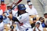 GLENDALE, AZ - MARCH 13:   Manny Ramirez #99 of the Los Angeles Dodgers at bat during a Spring Training game against the Texas Rangers on March 13, 2009 at Camelback Ranch in Glendale, Arizona.  (Photo by Lisa Blumenfeld/Getty Images)