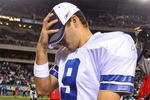 PHILADELPHIA - DECEMBER 28:  Tony Romo #9 of the Dallas Cowboys walks off the field after playing the Philadelphia Eagles on December 28, 2008 at Lincoln Financial Field in Philadelphia, Pennsylvania. The Eagles defeated the Cowboys 44-6.  (Photo by Jim McIsaac/Getty Images)