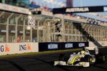 MELBOURNE, AUSTRALIA - MARCH 29:  (EDITORS NOTE: A TILT SHIFT LENS WAS USED IN THE CREATION OF THIS IMAGE) Jenson Button of Great Britain and Brawn GP drives on his way to winning the Australian Formula One Grand Prix at the Albert Park Circuit on March 29, 2009 in Melbourne, Australia.  (Photo by Robert Cianflone/Getty Images)