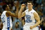 CHARLOTTE, NC - MARCH 15:  Tyler Hansbrough #50 of the North Carolina Tar Heels reacts with teammate Wayne Ellington #22 after Hansbrough made the game-winning shot with .8 seconds left against the Virginia Tech Hokies during the semifinals of the 2008 Men's ACC Basketball Tournament at Bobcats Arena on March 15, 2008 in Charlotte, North Carolina.  (Photo by Kevin C. Cox/Getty Images)