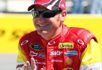 MARTINSVILLE, VA - MARCH 29: Clint Bowyer, driver of the #33 BB&T Chevrolet, waves to fans prior to the start of the NASCAR Sprint Cup Series Goody's Fast Pain Relief 500 at the Martinsville Speedway on March 29, 2009 in Martinsville, Virginia.  (Photo by Jim McIsaac/Getty Images)