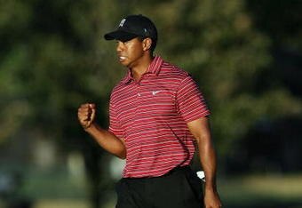 ORLANDO, FL - MARCH 29:  Tiger Woods celebrates a birdie putt on the 15th hole during the final round of the Arnold Palmer Invitational Presented by Mastercard at the Bay Hill Club and Lodge on March 29, 2009 in Orlando, Florida   (Photo by Doug Benc/Getty Images)