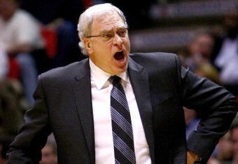 EAST RUTHERFORD, NJ - MARCH 27: Head coach Phil Jackson of the Los Angeles Lakers screams instructions against the New Jersey Nets during their game on March 27, 2009 at the Izod Center in East Rutherford, New Jersey. NOTE TO USER: User expressly acknowledges and agrees that, by downloading and/or using this Photograph, User is consenting to the terms and conditions of the Getty Images License Agreement.  (Photo by Chris McGrath/Getty Images)