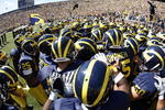 ANN ARBOR, MI - SEPTEMBER 6:  The Michigan Wolverines huddle together in a huddle prior to the game against the Miami of Ohio Red Hawks on September 6, 2008 at Michigan Stadium in Ann Arbor, Michigan.  The Wolverines defeated the Red Hawks 16-6. (Photo by Gregory Shamus/Getty Images)