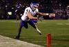 SAN DIEGO, CA - DECEMBER 23:  Runningback Ian Johnson #41 of the Boise State Broncos dives for the endzone pilon against the defense of Cornerback Rafael Priest #10 of TCU during the San Diego County Credit Union Poinsettia Bowl at Qualcomm Stadium on December 23, 2008 in San Diego, California. (Photo by Donald Miralle/Getty Images)