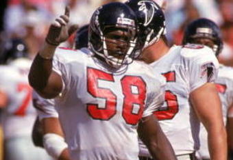 SAN FRANCISCO - SEPTEMBER 23:  Linebacker Jessie Tuggle #58 of the Atlanta Falcons on the field before a play during a game against the San Francisco 49ers at Candlestick Park on September 23, 1990 in San Francisco, California.  (Photo by George Rose/Getty Images)