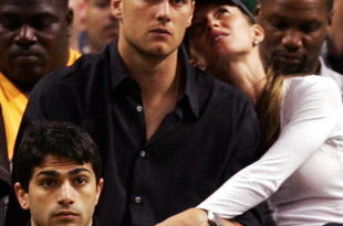 BOSTON - MAY 22:  Tom Brady of the New England Patriots and Giselle Bundchen watch as the Detroit Pistons play against the Boston Celtics during Game Two of the 2008 NBA Eastern Conference finals at the TD Banknorth Garden on May 22, 2008 in Boston, Massachusetts. NOTE TO USER: User expressly acknowledges and agrees that, by downloading and or using this photograph, User is consenting to the terms and conditions of the Getty Images License Agreement  (Photo by Elsa/Getty Images)
