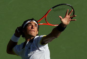 NEW YORK - SEPTEMBER 02:  Jeremy Chardy of France serves to Gael Monfils of France during day three of the 2009 U.S. Open at the USTA Billie Jean King National Tennis Center on September 2, 2009 in Flushing neighborhood of the Queens borough of New York City.  (Photo by Al Bello/Getty Images)