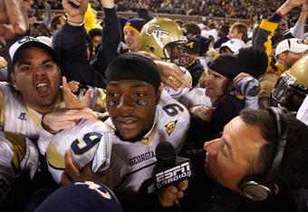 ATLANTA - OCTOBER 17:  Quarterback Josh Nesbitt #9 of the Georgia Tech Yellow Jackets is interviewed by ESPN Radio on the field after their 28-23 win over the Virginia Tech Hokies at Bobby Dodd Stadium on October 17, 2009 in Atlanta, Georgia.  (Photo by Kevin C. Cox/Getty Images)
