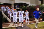 STARKVILLE, MS - OCTOBER 24:  Head coach Urban Meyer of the University of Florida Gators, leads the team onto the field against the Mississippi State Bulldogs, at Davis Wade Stadium on  October 24, 2009 in Starkville, Mississippi  (Photo by Rick Dole/Getty Images)