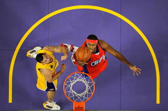 LOS ANGELES, CA - OCTOBER 27:  Craig Smith #5 of the Los Angeles Clippers goes to the basket against Jordan Farmar #1  of the Los Angeles Lakers during the season opening game at Staples Center on October 27, 2009 in Los Angeles, California.  NOTE TO USER: User expressly acknowledges and agrees that, by downloading and or using this photograph, User is consenting to the terms and conditions of the Getty Images License Agreement. Mandatory Copyright Notice: Copyright 2009 NBAE  (Photo by Kevork Djansezian/Getty Images)