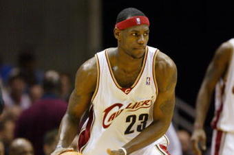 CLEVELAND - DECEMBER 9:  LeBron James #23 of the Cleveland Cavaliers passes the ball during the game against the Toronto Raptors at Gund Arena on December 9, 2003 in Cleveland, Ohio.  The Raptorss won 100-93.  NOTE TO USER: User expressly acknowledges and agrees that, by downloading and/or using this Photograph, User is consenting to the terms and conditions of the Getty Images License Agreement (Photo by Andy Lyons/Getty Images) 