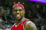 CLEVELAND - OCTOBER 27:  LeBron James #23 of the Cleveland Cavaliers reacts during the season opener against the Boston Celtics at Quicken Loans Arena on October 27, 2009 in Cleveland, Ohio.  NOTE TO USER: User expressly acknowledges and agrees that, by downloading and or using this photograph, User is consenting to the terms and conditions of the Getty Images License Agreement. (Photo by Gregory Shamus/Getty Images)