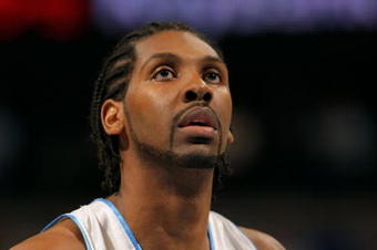 DENVER - MAY 05:  Nene #31 of the Denver Nuggets takes a free throw against the Dallas Mavericks in Game Two of the Western Conference Semifinals during the 2009 NBA Playoffs at Pepsi Center on May 5, 2009 in Denver, Colorado. The Nuggets defeated the Mavericks 117-105. NOTE TO USER: User expressly acknowledges and agrees that, by downloading and or using this photograph, User is consenting to the terms and conditions of the Getty Images License Agreement.  (Photo by Doug Pensinger/Getty Images)