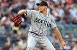 NEW YORK - JULY 01:  Jarrod Washburn #56 of the Seattle Mariners pitches against the New York Yankees on July 1, 2009 at Yankee Stadium in the Bronx borough of New York City.  (Photo by Jim McIsaac/Getty Images)