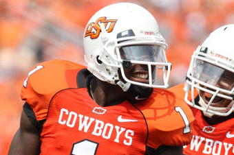 STILLWATER, OK - SEPTEMBER 5:  Wide receiver Dez Bryant #1 of the Oklahoma State Cowboys celebrates his touchdown with teammate Dexter Pratt #22 during the second quarter of the game against the Georgia Bulldogs at Boone Pickens Stadium on September 5, 2009 in Stillwater, Oklahoma. (Photo by Christian Petersen/Getty Images)