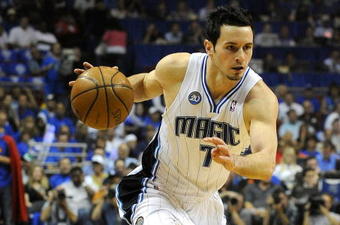 ORLANDO, FL - MAY 14:  J.J. Redick #7 of the Orlando Magic looks to drive against the Boston Celtics in Game Six of the Eastern Conference Semifinals during the 2009 NBA Playoffs at Amway Arena on May 14, 2009 in Orlando, Florida.  NOTE TO USER: User expressly acknowledges and agrees that, by downloading and/or using this Photograph, user is consenting to the terms and conditions of the Getty Images License Agreement.  (Photo by Sam Greenwood/Getty Images)
