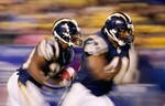 SAN DIEGO - DECEMBER 17:   Runningbacks Michael Turner #33 and Lorenzo Neal #41 of the San Diego Chargers return a kick against the Kansas City Chiefs during their NFL game on December 17, 2006 at Qualcomm Stadium in San Diego, California.  (Photo by Donald Miralle/Getty Images)