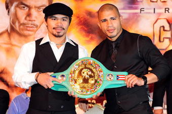 BEVERLY HILLS, CA - SEPTEMBER 14:  Manny Pacquiao and  Miguel Cotto pose for pictures during the press conference at the Beverly Hills Hotel on September 14, 2009 in Beverly Hills, California.  (Photo by Jacob de Golish/Getty Images)