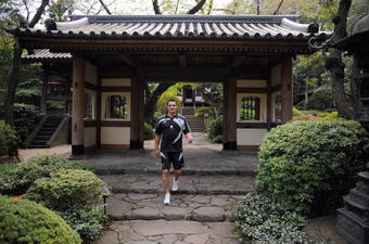 TOKYO - OCTOBER 29:  Dan Carter walks in the Japanese garden at the team hotel following a New Zealand All Blacks training session at Kubota Spears Rugby Field in Chiba on October 29, 2009 in Funabashi, Japan.  (Photo by Ross Land/Getty Images)