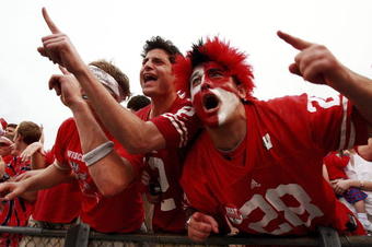 ORLANDO, FL - JANUARY 1:  Fans of the Wisconsin Badgers celebrate after defeating the Arkansas Razorbacks in the Capitol One Bowl at Florida Citrus Bowl January 1, 2007 in Orlando, Florida. Wisconsin defeated Arkansas 17-14.  (Photo by Doug Benc/Getty Images)