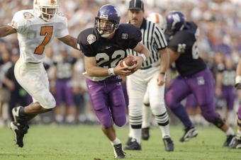 1 Jan 1997:  Wide receiver Brian Musso of the Northwestern Wildcats runs with the ball during the Citrus Bowl against the Tennessee Volunteers at the Citrus Bowl in Orlando, Florida.  Tennessee won the game, 48-28. Mandatory Credit: Andy Lyons  /Allsport