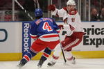 NEW YORK - OCTOBER 26:  Michael Del Zotto #4 of the New York Rangers lines up Martin Hanzal #11 of the Phoenix Coyotes at Madison Square Garden on October 26, 2009 in New York, New York. (Photo by Bruce Bennett/Getty Images)