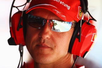VALENCIA, SPAIN - AUGUST 21:  Former Ferrari F1 World Champion Michael Schumacher of Germany watches from the pitwall during practice for the European Formula One Grand Prix at the Valencia Street Circuit on August 21, 2009, in Valencia, Spain.  (Photo by Ryan Pierse/Getty Images)