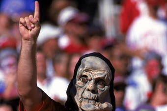31 Oct 1999: A fan of the Arizona Cardinals dresses up in a scary halloween costume during the game against the New England Patriots at the Sun Devil Stadium in Tempe, Arizona. The Patriots defeated the Cardinals 27-3. Mandatory Credit: Donald Miralle  /Allsport
