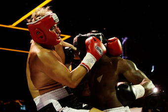 SYDNEY, AUSTRALIA - OCTOBER 29:  NRL player Wendell Sailor competes against former AFL player Warwick Capper during a celebrity boxing match in the Sports Theatre at Star City on October 29, 2009 in Sydney, Australia.  (Photo by Brendon Thorne/Getty Images)