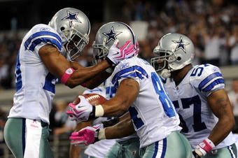 ARLINGTON, TX - OCTOBER 25:  (L-R) Alan Ball #20 and Patrick Crayton #84 of the Dallas Cowboys celebrate a touchdown against the Atlanta Falcons at Cowboys Stadium on October 25, 2009 in Arlington, Texas.  (Photo by Ronald Martinez/Getty Images)