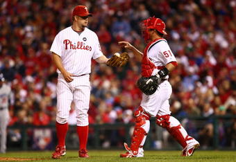 PHILADELPHIA - OCTOBER 19:  Catcher Carlos Ruiz (R) #51 of the Philadelphia Phillies walks out to the mound to talk with starting pitcher Joe Blanton #56 after Blanton gave up a RBI single to Russell Martin #55 of the Los Angeles Dodgers in the top of the fourth inning of Game Four of the NLCS during the 2009 MLB Playoffs at Citizens Bank Park on October 19, 2009 in Philadelphia, Pennsylvania.  (Photo by Chris McGrath/Getty Images)