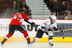 OTTAWA, ON - OCTOBER 15:  Martin St. Louis #26 of the Tampa Bay Lightning skates for the puck against Alexandre Picard of the Ottawa Senators during a game at Scotiabank Place on October 15, 2009 in Ottawa, Canada.  The Ottawa Senators defeated the Tampa Bay Lightning 7-1.  (Photo by Phillip MacCallum/Getty Images)