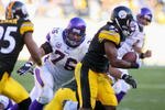 PITTSBURGH - OCTOBER 25: Steve Hutchinson #76 of the Minnesota Vikings tries in vain to catch Keyaron Fox #57 of the Pittsburgh Steelers after Fox intercepted Brett Favre (not shown)and runs 82 yards for a touchdown at Heinz Field on October 25, 2009 in Pittsburgh, Pennsylvania. Pittsburgh won 27-17.  (Photo by Rick Stewart/Getty Images)
