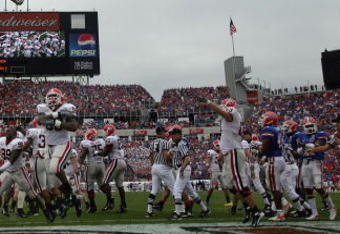 JACKSONVILLE, FL - OCTOBER 27:  The Georgia Bulldogs celebrate a touchdown against the Florida Gators in the first quarter at Jacksonville Municipal Stadium on October 27, 2007 in Jacksonville, Florida.  (Photo by Ronald Martinez/Getty Images)