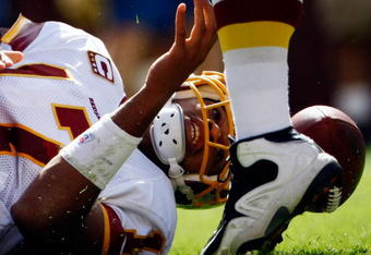 LANDOVER, MD - SEPTEMBER 20:  Quarterback Jason Campbell #17 of the Washington Redskins loses the football near the goal line but later recovered it against the St. Louis Rams during their game on September 20, 2009 at FedEx Field in Landover, Maryland.  The Redskins defeated the Rams by a score of 9-7.  (Photo by Win McNamee/Getty Images)