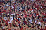 3 Jan 2002:   Nebraska cornhusker fans at attention during the National Anthem during the Rose Bowl National Championship Game versus Miami at the Rose Bowl in Pasadena, California.  Miami won 37-14.  DIGITAL IMAGE    Mandatory Credit:  Stephen Dunn/Getty Images