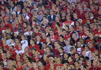 3 Jan 2002:   Nebraska cornhusker fans at attention during the National Anthem during the Rose Bowl National Championship Game versus Miami at the Rose Bowl in Pasadena, California.  Miami won 37-14.  DIGITAL IMAGE    Mandatory Credit:  Stephen Dunn/Getty Images