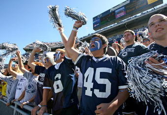 STATE COLLEGE, PA - SEPTEMBER 19: Penn State Nittany Lion fans cheer for the marching band before a game against the Temple Owls on September 19, 2009 at Beaver Stadium in State College, Pennsylvania. (Photo by Hunter Martin/Getty Images)