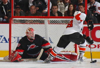PHILADELPHIA - DECEMBER 11: Mike Richards #18 of the Philadelphia Flyers takes the shot against Michael Leighton #49 of the Carolina Hurricanes on December 11, 2008 at the Wachovia Center in Philadelphia, Pennsylvania. (Photo by Bruce Bennett/Getty Images)