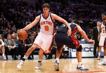 NEW YORK - FEBRUARY 04:  Danilo Gallinari #8 of the New York Knicks drives to the basket against the Cleveland Cavaliers on February 4, 2009 at Madison Square Garden in New York City. NOTE TO USER: User expressly acknowledges and agrees that, by downloading and or using this photograph, User is consenting to the terms and conditions of the Getty Images License Agreement.  (Photo by Nick Laham/Getty Images)
