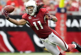 GLENDALE, AZ - SEPTEMBER 13:  Wide receiver Larry Fitzgerald #11 of the Arizona Cardinals is unable to catch a pass during the NFL game against the San Francisco 49ers at the Universtity of Phoenix Stadium on September 13, 2009 in Glendale, Arizona. The 49ers defeated the Cardinals 20-16.  (Photo by Christian Petersen/Getty Images)