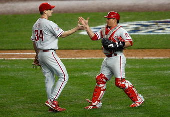 NEW YORK - OCTOBER 28:  (L-R) Cliff Lee #34 and Carlos Ruiz #51 of the Philadelphia Phillies celebrate after their 6-1 win against the New York Yankees in Game One of the 2009 MLB World Series at Yankee Stadium on October 28, 2009 in the Bronx borough of New York City.  (Photo by Jared Wickerham/Getty Images)