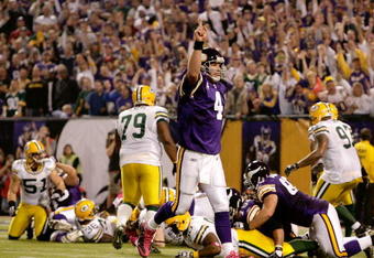 MINNEAPOLIS - OCTOBER 05:  Quarterback Brett Favre #4 of the Minnesota Vikings celebrates after a touchdown during the game against the Green Bay Packers on October 5, 2009 at Hubert H. Humphrey Metrodome in Minneapolis, Minnesota.  (Photo by Jamie Squire/Getty Images)