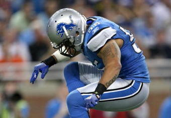 DETROIT - SEPTEMBER 20:  Linebacker Larry Foote #55 of the Detroit Lions celebrates after sacking quarterback Brett Favre of the Minnesota Vikings at Ford Field on September 20, 2009 in Detroit, Michigan. (Photo by Stephen Dunn/Getty Images)