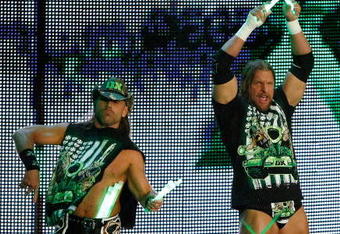 LAS VEGAS - AUGUST 24:  Wrestlers and tag team partners Shawn Michaels (L) and Triple H are introduced during the WWE Monday Night Raw show at the Thomas & Mack Center August 24, 2009 in Las Vegas, Nevada.  (Photo by Ethan Miller/Getty Images)