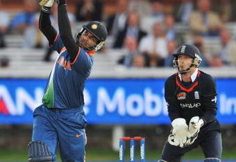 LONDON, ENGLAND - JUNE 14: Yuvraj Singh of India hits out watched by James Foster of England during the ICC World Twenty20 Super Eights match between England and India at Lord's on June 14, 2009 in London, England.  (Photo by Christopher Lee/Getty Images)