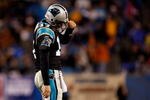 CHARLOTTE, NC - JANUARY 10:  Jake Delhomme #17 of the Carolina Panthers reacts at the end of the fourth quarter during the game against the Arizona Cardinals during the NFC Divisional Playoff Game on January 10, 2009 at Bank of America Stadium in Charlotte, North Carolina.  (Photo by Streeter Lecka/Getty Images)